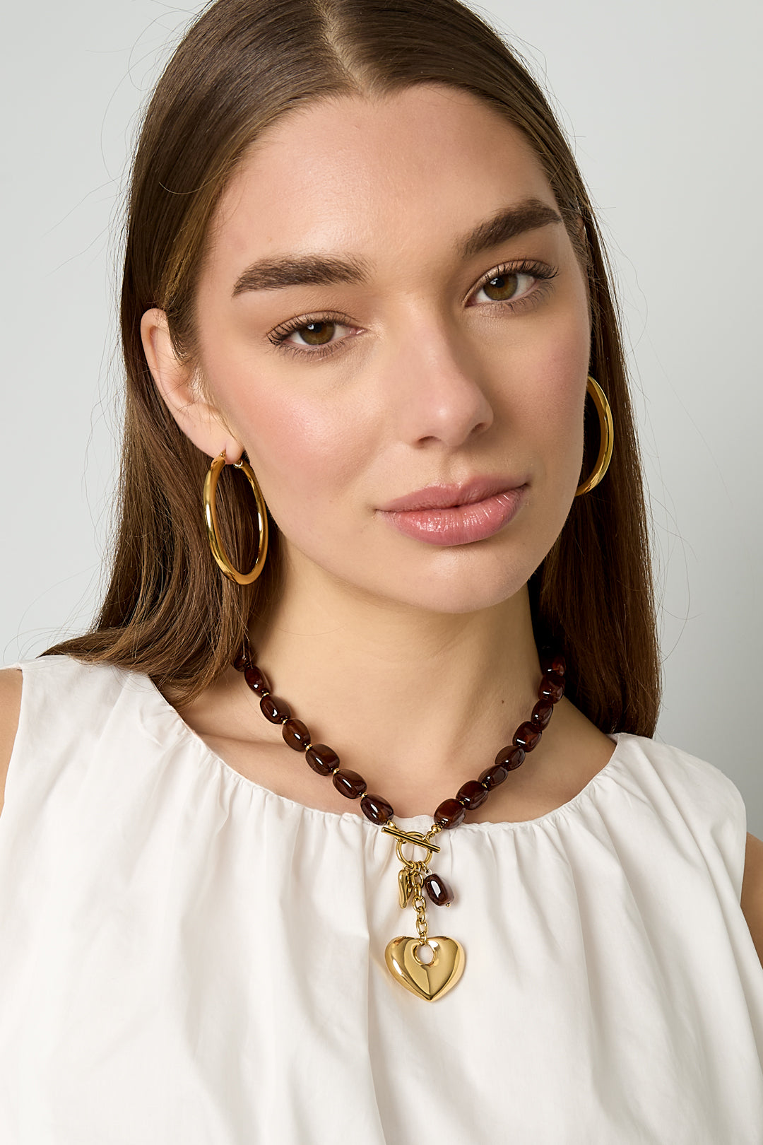 Squoval kralenketting hangend hart